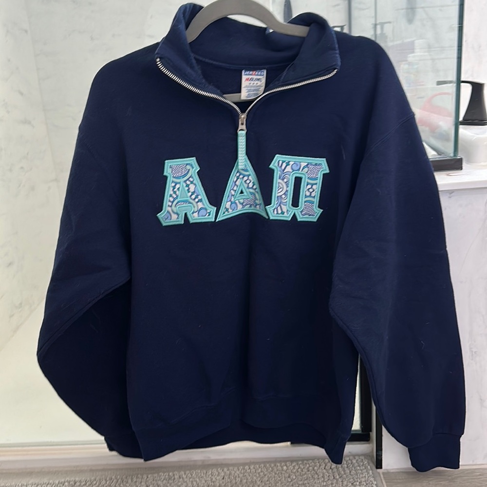 Navy ADPi lettered quarter zip. Size medium